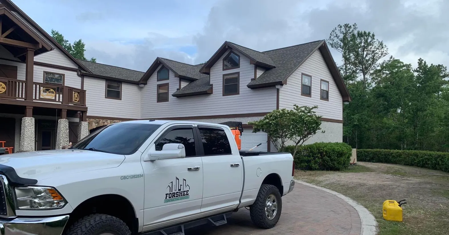 Forshee truck in front of house